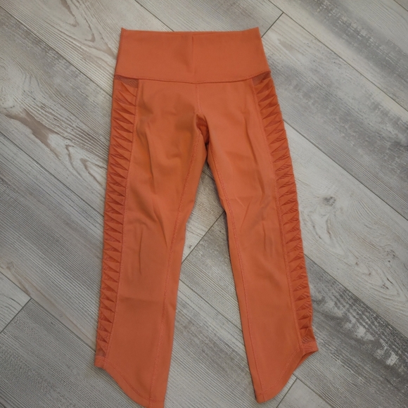 Lululemon Athletica Sunshine Salutation Bright Coral Cropped Leggings - Picture 5 of 10
